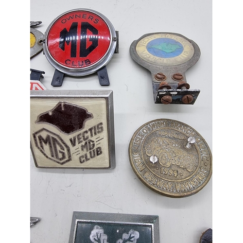 1399 - Automobilia: a collection of car radiator badges and others. 