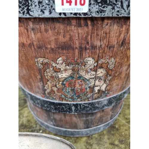 1418 - A coopered oak bucket, with rope handle and emblazoned with the Royal Standard; together with a... 