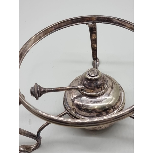 1526 - A Christopher Dresser style electroplated kettle on burner stand, 25cm high.