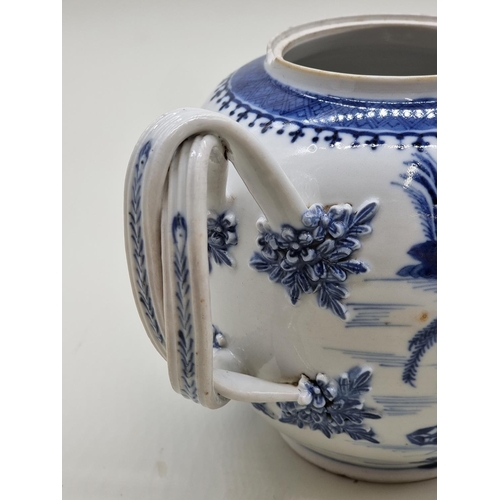 1529 - A large Chinese blue and white teapot and cover, late 18th century, 16.5cm high, (s.d).... 