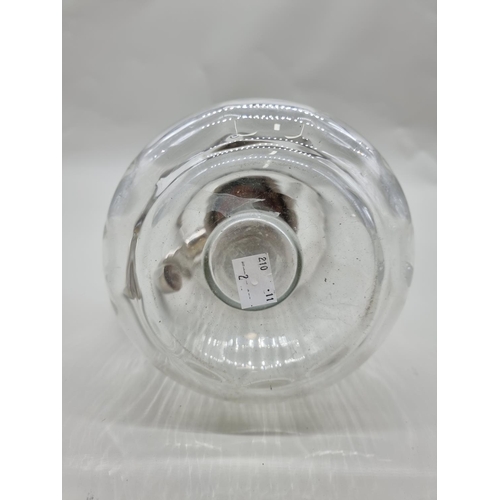 1536 - An electroplated clear glass lemonade jug and liner, 28cm high.