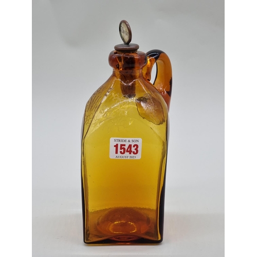 1543 - A Victorian amber glass whisky jug and mother of pearl stopper, with etched registration lozenge, he... 