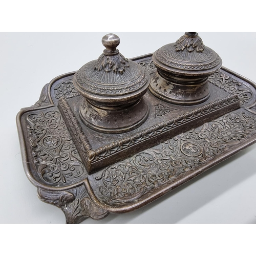 1548 - A Continental brass and glass casket, 14.5cm wide; together with a plated metal inkwell, 24cm wide.... 