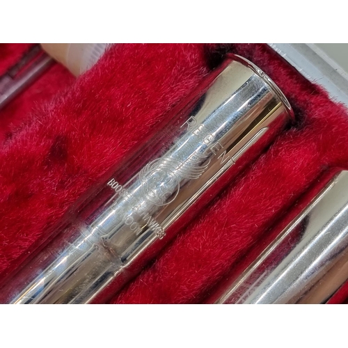 1570 - A Boosey & Hawkes Regent electroplated flute, in padded case. 