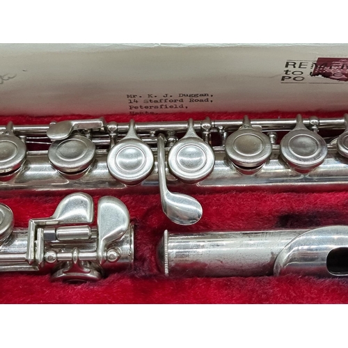 1570 - A Boosey & Hawkes Regent electroplated flute, in padded case. 