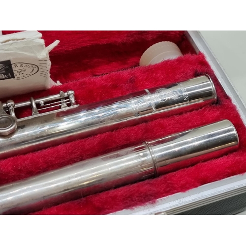 1570 - A Boosey & Hawkes Regent electroplated flute, in padded case. 