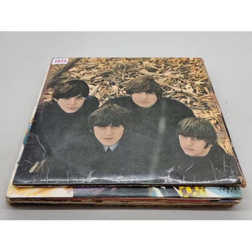 1573 - A small quantity of 33rpm vinyl records, to include the Beatles, David Bowie, and David Essex. ... 