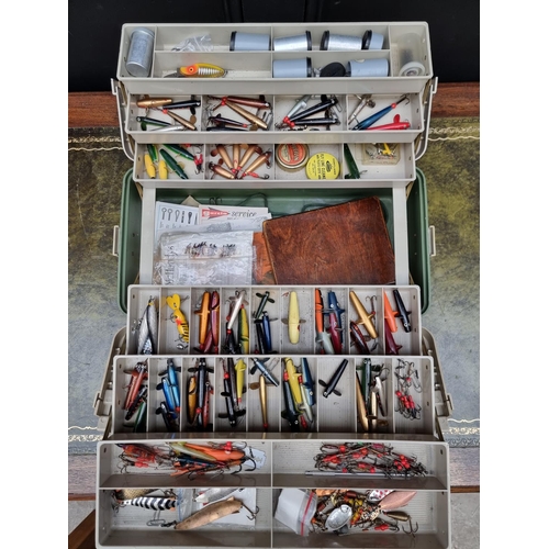 1600 - Angling: a large lure/tackle box containing over 100 vintage lures; together with a few fl... 