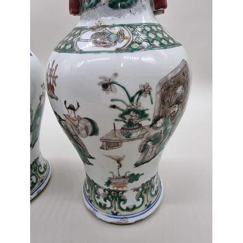 1602 - A large pair of Chinese famille verte twin handled vases, Qing, 36cm high, (s.d).