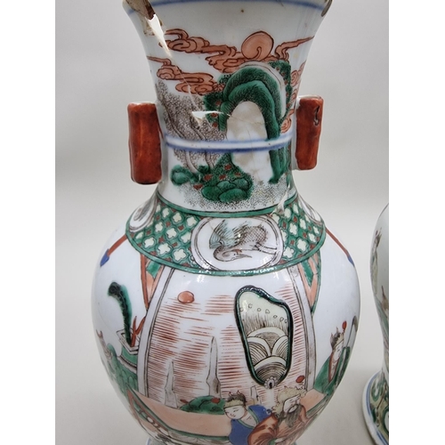 1602 - A large pair of Chinese famille verte twin handled vases, Qing, 36cm high, (s.d).