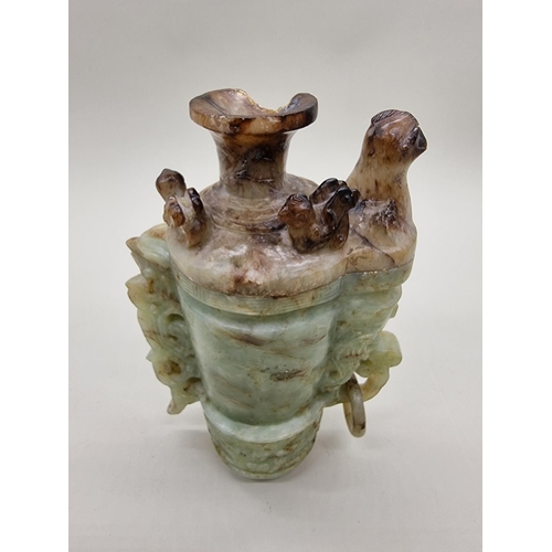 1605 - A Chinese Archaistic style carved green and russet jade ewer and cover, 22cm high, (chips to co... 