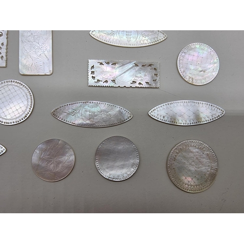 1618 - A collection of Chinese mother of pearl gaming counters. (30)