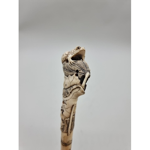 1628 - A good Japanese carved stag antler obi-hasami or Sashi netsuke, Meiji, probably Asakusa school, fine... 