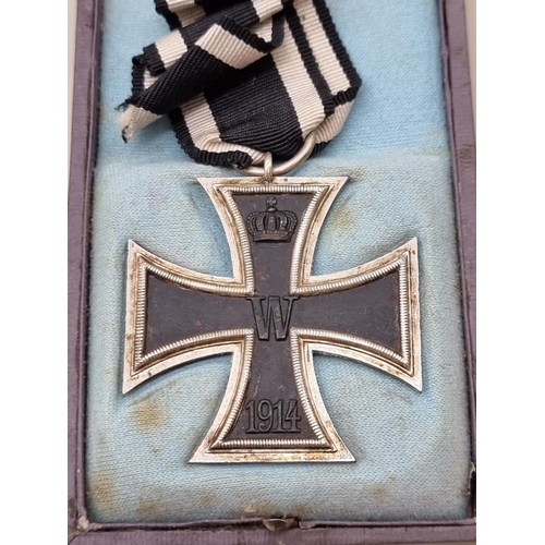 1644 - A World War I German Iron Cross, 2nd Class, the suspension ring stamped 800, in case with lid inscri... 