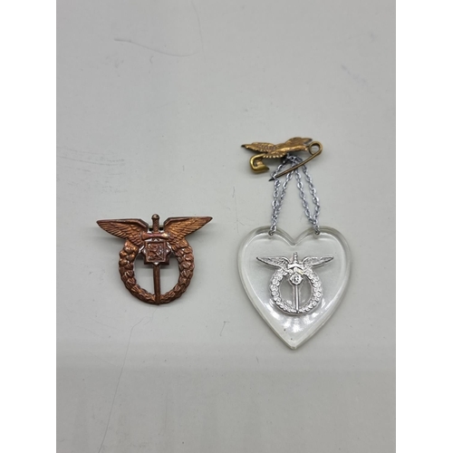 1645 - A World War II Czech Air Force miniature pilots' badge, 2.4cm; together with a similar perspex and w... 