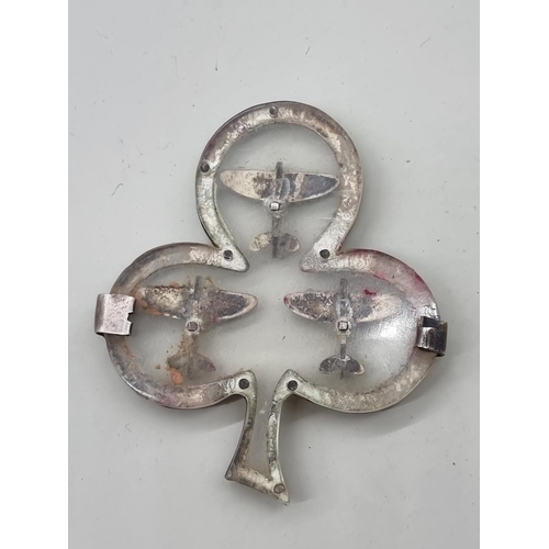 1648 - An unusual World War II white metal and perspex sweetheart brooch, of trefoil form and decorated thr... 