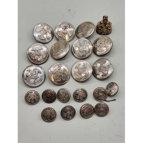 1657 - A set of eleven 'Superior Quality' buttons, 25mm diameter; together with a set of ten similar smalle... 