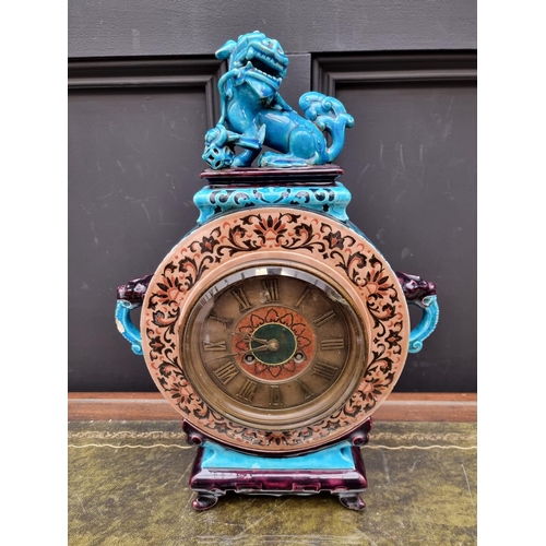 1666 - A French Aesthetic faience mantel clock, by Jules Vieillard, Bordeaux, 41cm high, (lacking pend... 