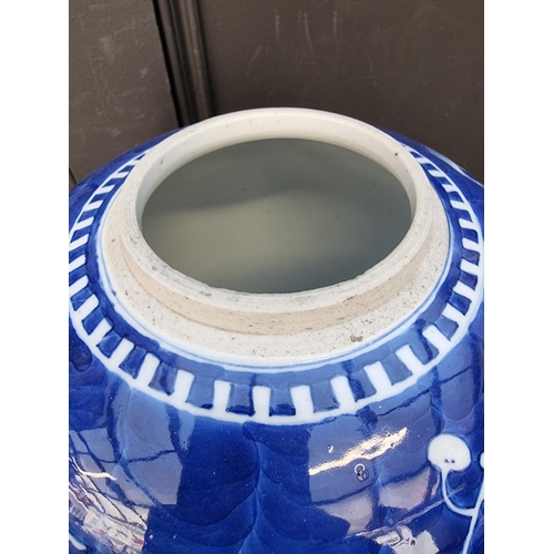 1670 - A large Chinese blue and white jar, 28cm high, on hardwood stand. 