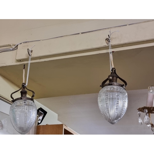 1676 - A small pair of Edwardian cut glass ceiling lights, with original fittings, 23.5cm high. (2)... 