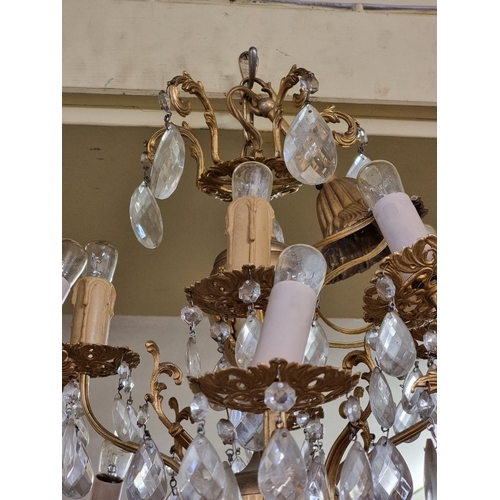 1677 - A modern brass eight branch chandelier, 60cm diameter. 