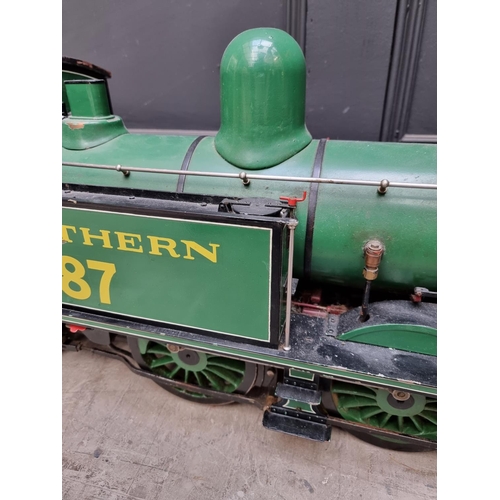 1683 - A 5in gauge 0-4-4 live steam tank locomotive and tender, total length 150cm; together with vari... 