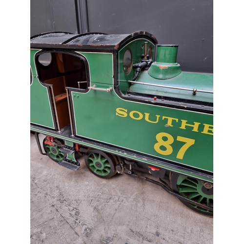 1683 - A 5in gauge 0-4-4 live steam tank locomotive and tender, total length 150cm; together with vari... 