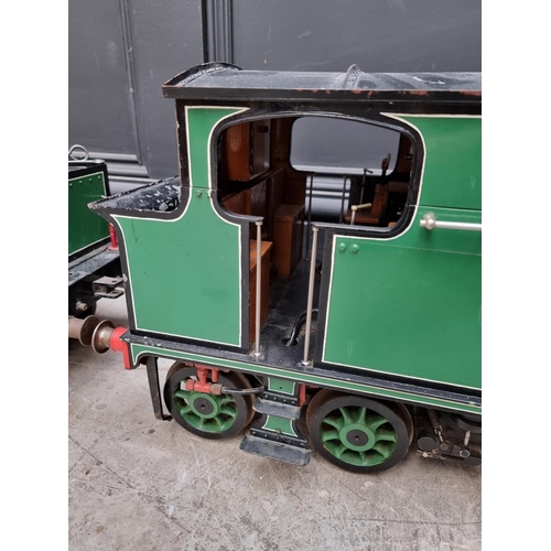 1683 - A 5in gauge 0-4-4 live steam tank locomotive and tender, total length 150cm; together with vari... 