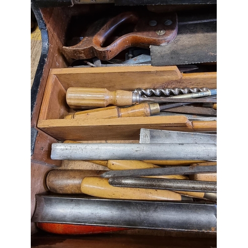 1684 - An interesting collection of carpenter's tools, some inscribed 'W H Good', in ebonized chest, 5... 