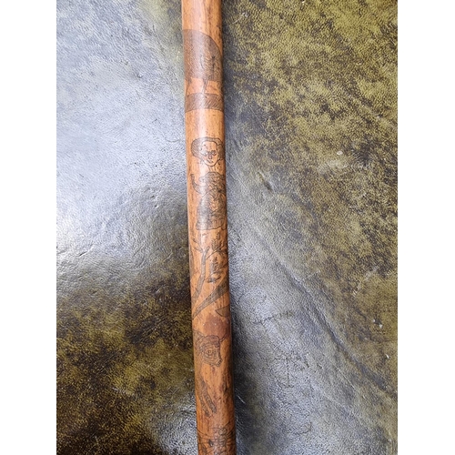 1694 - A very interesting Victorian carved cane, finely engraved all over with figures and exotic anim... 