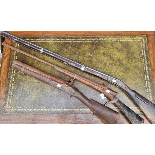 1699 - A reproduction flintlock blunderbuss; together with two muskets. (3)