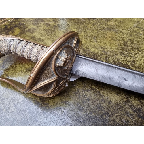 1701 - A British Royal Navy 1827 pattern officer's sword, with 73cm shortened blade.