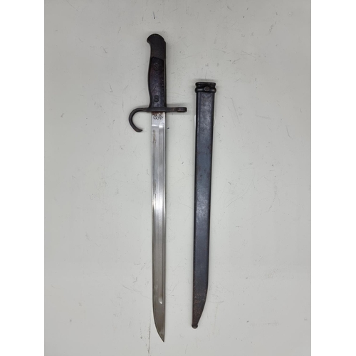 1704 - A Japanese type 30 bayonet and scabbard, with 40cm blade.