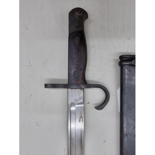 1704 - A Japanese type 30 bayonet and scabbard, with 40cm blade.