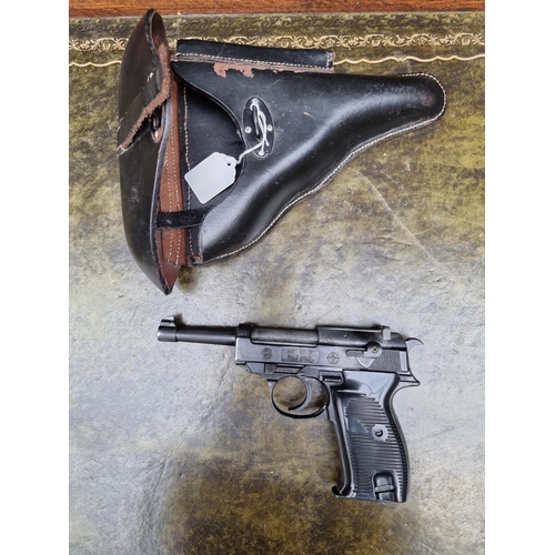 1717 - A BBM ME 38P 8mm top venting blank firing pistol, and leather holster.(This lot is offered for the p... 