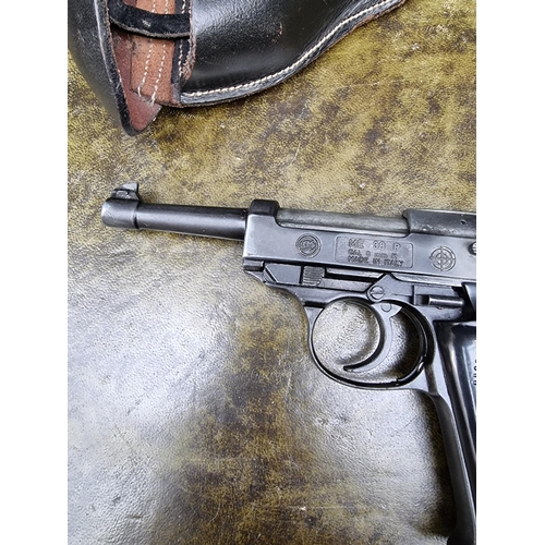 1717 - A BBM ME 38P 8mm top venting blank firing pistol, and leather holster.(This lot is offered for the p... 