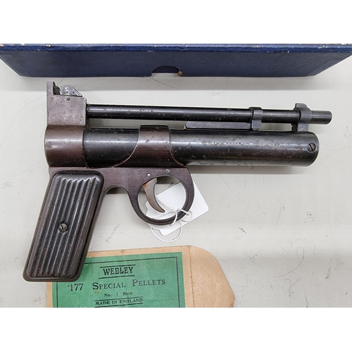 1722 - A Webley Junior .177 cal air pistol, Serial No: J21320, boxed with one spare seal.... 