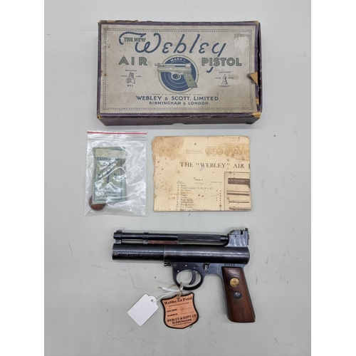 1723 - A Webley Mark I .22 cal air pistol, Serial No: 626, boxed with original spares and leaflets.... 