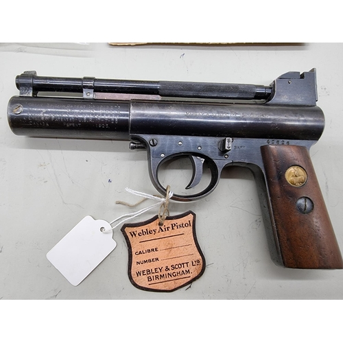 1723 - A Webley Mark I .22 cal air pistol, Serial No: 626, boxed with original spares and leaflets.... 