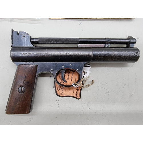 1723 - A Webley Mark I .22 cal air pistol, Serial No: 626, boxed with original spares and leaflets.... 