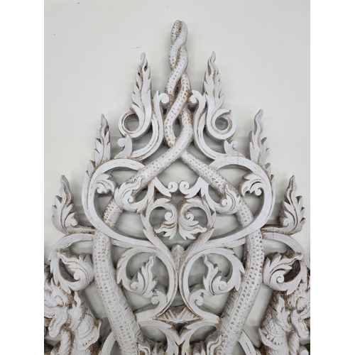 1735 - An Indonesian grey painted carved wood wall bracket, 58cm high. 