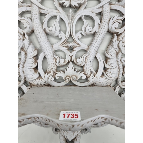 1735 - An Indonesian grey painted carved wood wall bracket, 58cm high. 