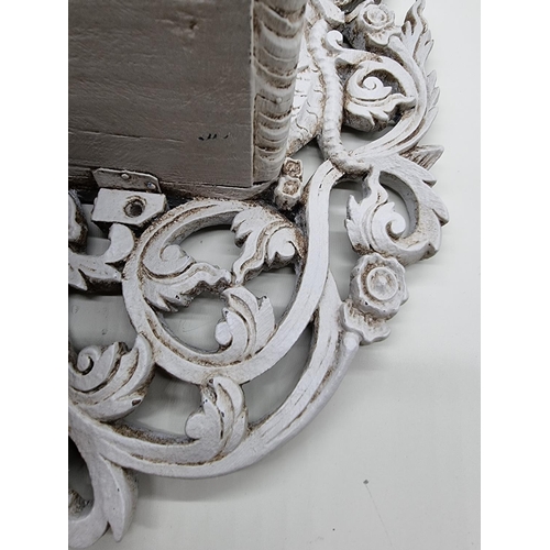 1735 - An Indonesian grey painted carved wood wall bracket, 58cm high. 