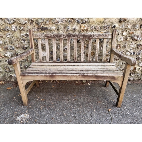 1760 - A teak garden bench, 122cm wide.