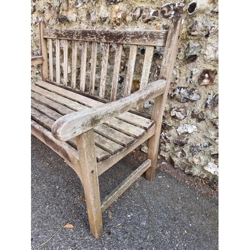 1760 - A teak garden bench, 122cm wide.