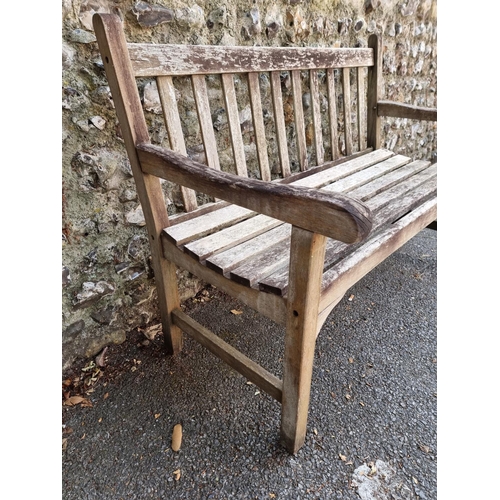 1760 - A teak garden bench, 122cm wide.