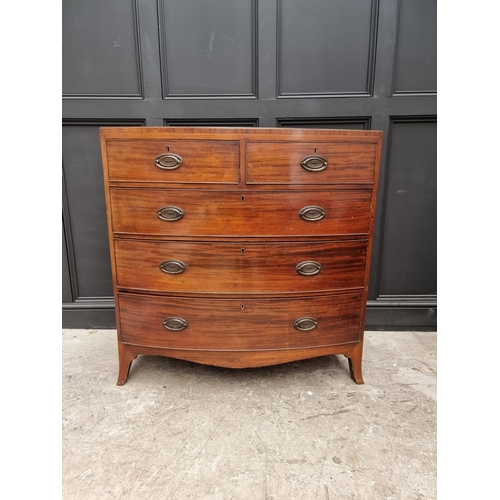 1762 - An early 19th century mahogany and line inlaid bowfront chest of drawers, 106cm wide. ... 