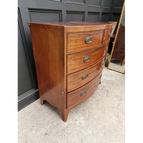 1762 - An early 19th century mahogany and line inlaid bowfront chest of drawers, 106cm wide. ... 