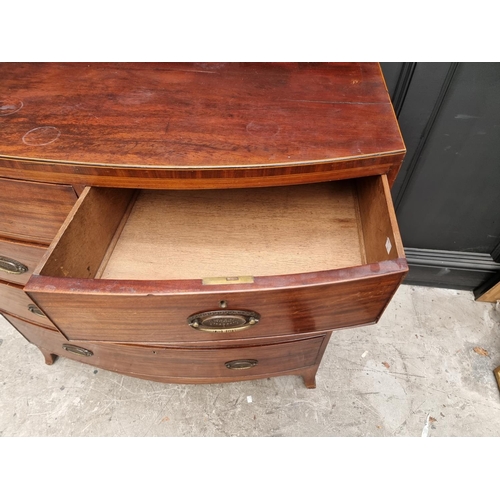 1762 - An early 19th century mahogany and line inlaid bowfront chest of drawers, 106cm wide. ... 