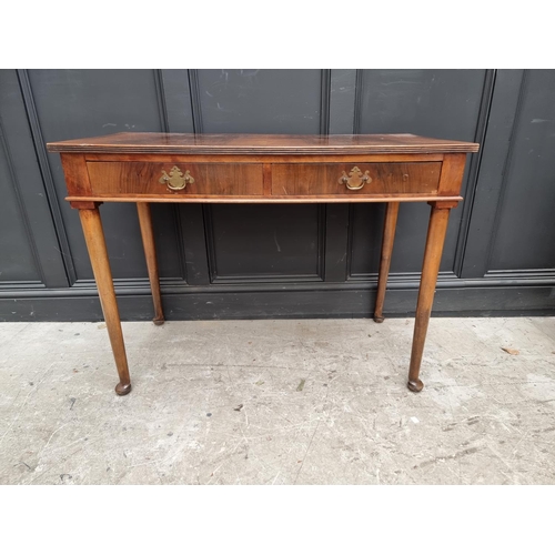 1763 - An Edwardian mahogany two drawer side table, 106cm wide. 